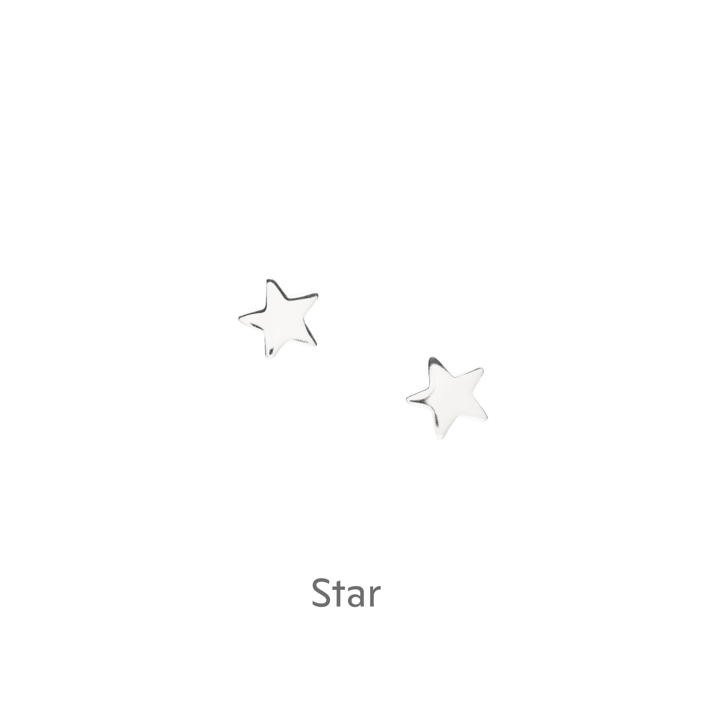 Silver star stud earrings on black background, Crumble and Core handcrafted jewellery