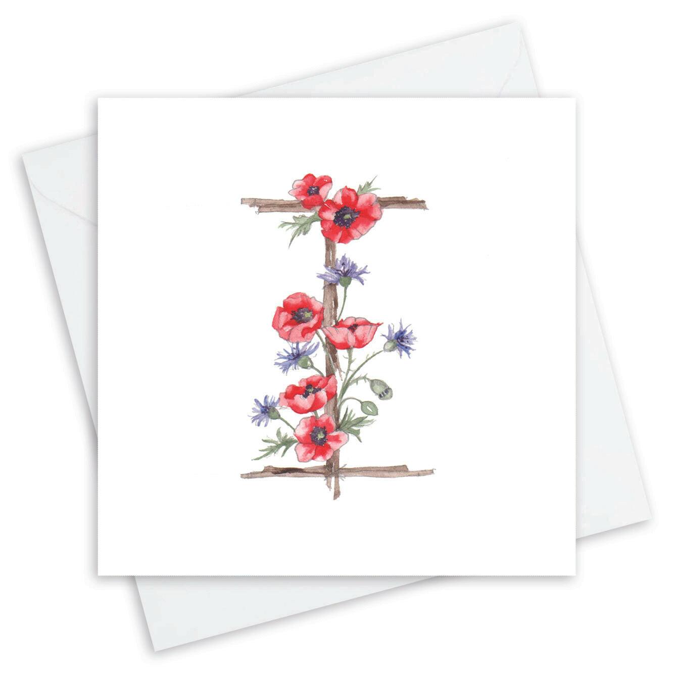 Handcrafted Crumble and Core card with floral letter I, poppies and wildflowers on white