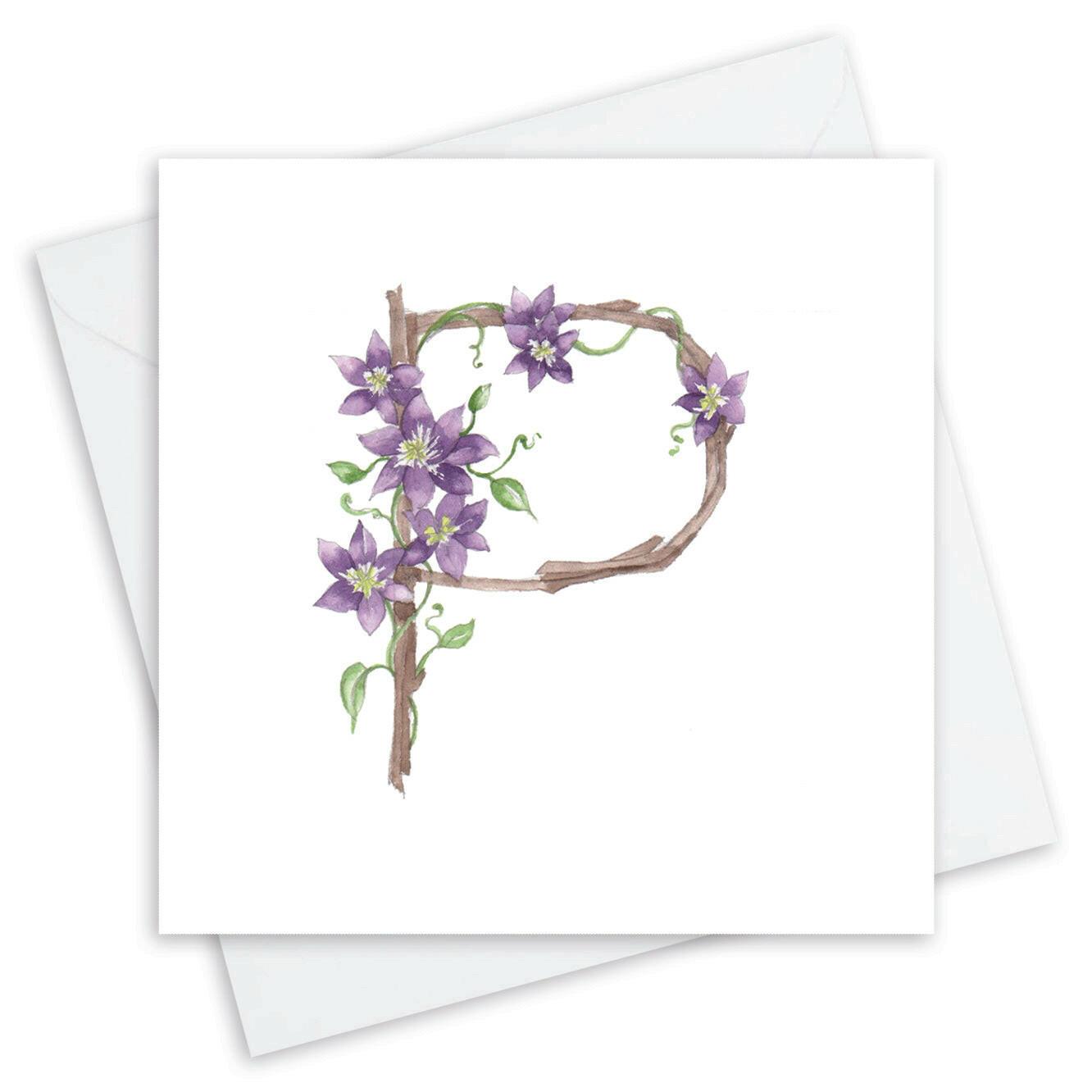 Handcrafted greeting card with purple flowers forming letter P, Crumble and Core design
