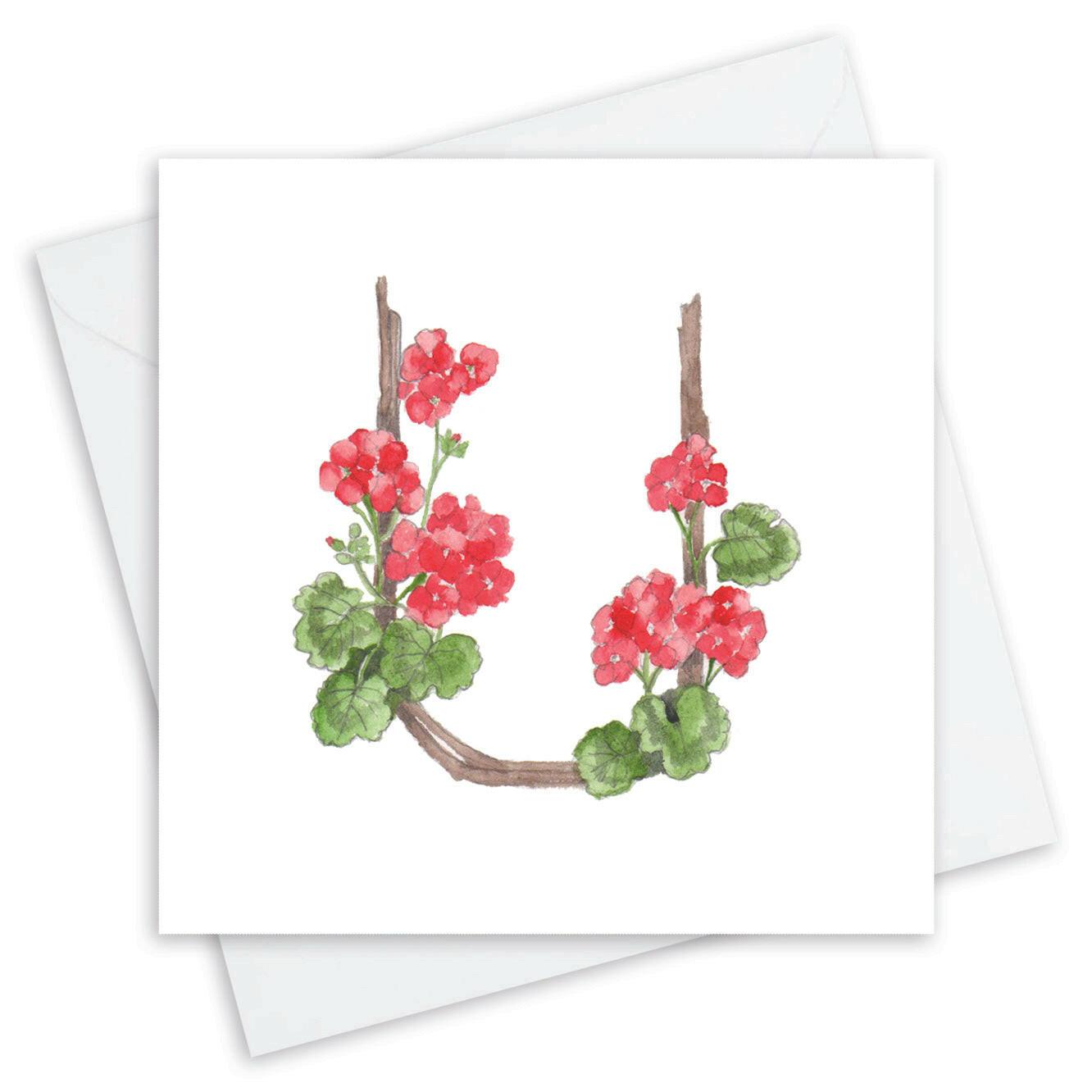 Handcrafted Crumble and Core greeting card with pink floral illustration and envelope