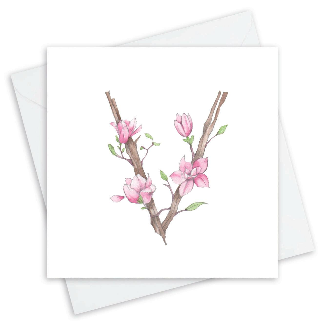 Handcrafted card with pink magnolia blossom illustration by Crumble and Core