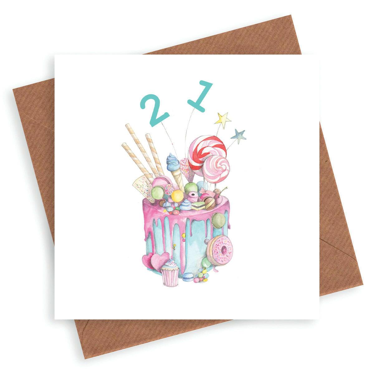 Handcrafted Crumble and Core 21st birthday card with illustrated cake, sweets, and brown envelope